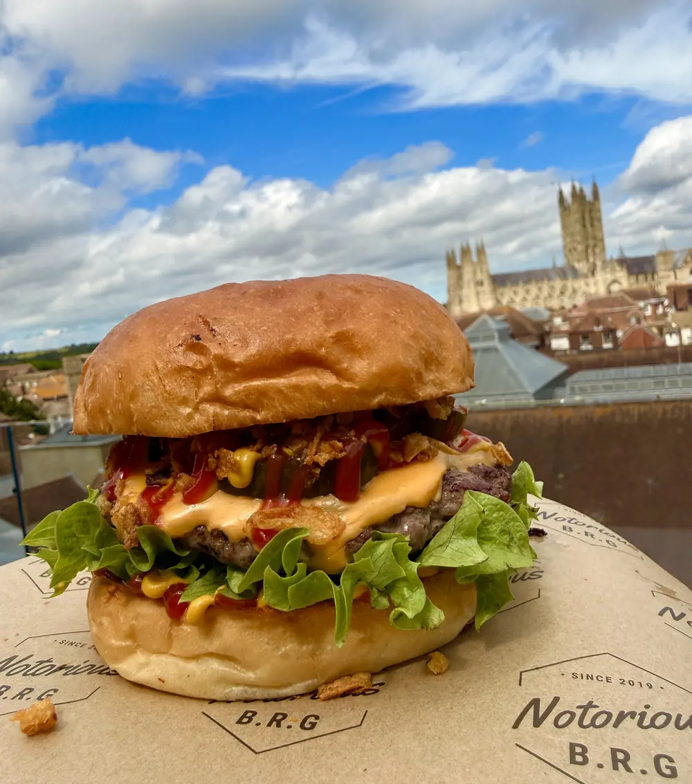 Notorious B.R.G cheeseburger with Canterbury Cathedral behind