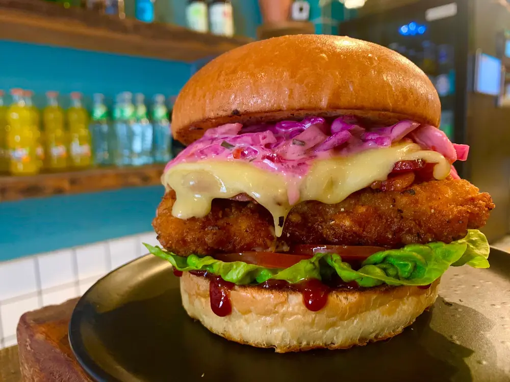 Crispy fried chicken burger with slaw