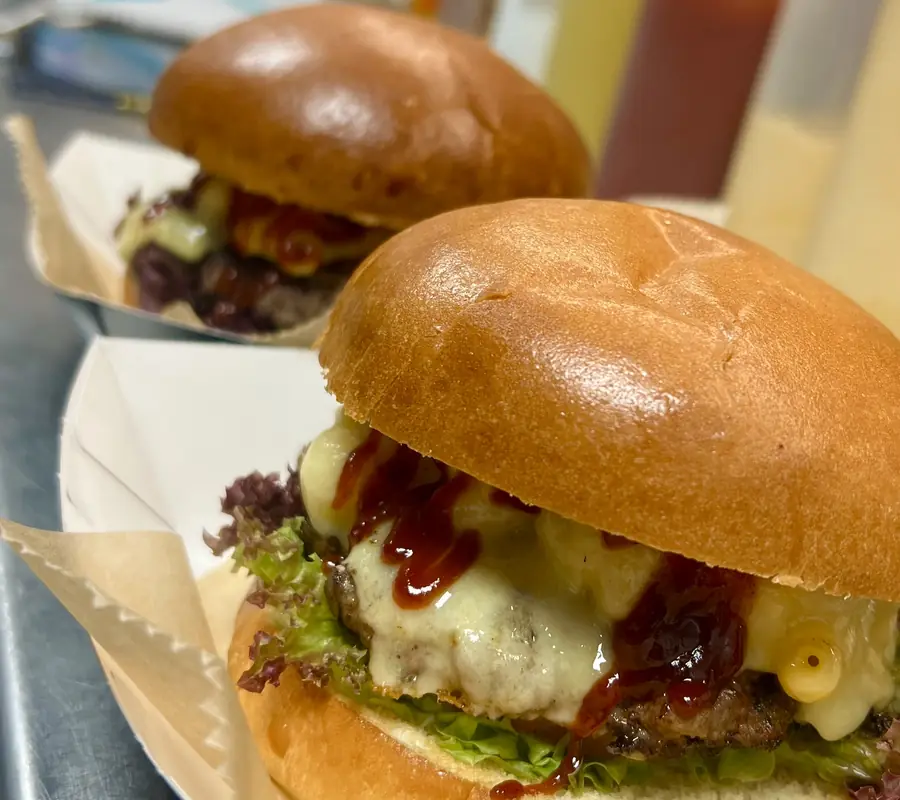 Two burgers on the counter at Love Food, Lockmeadow